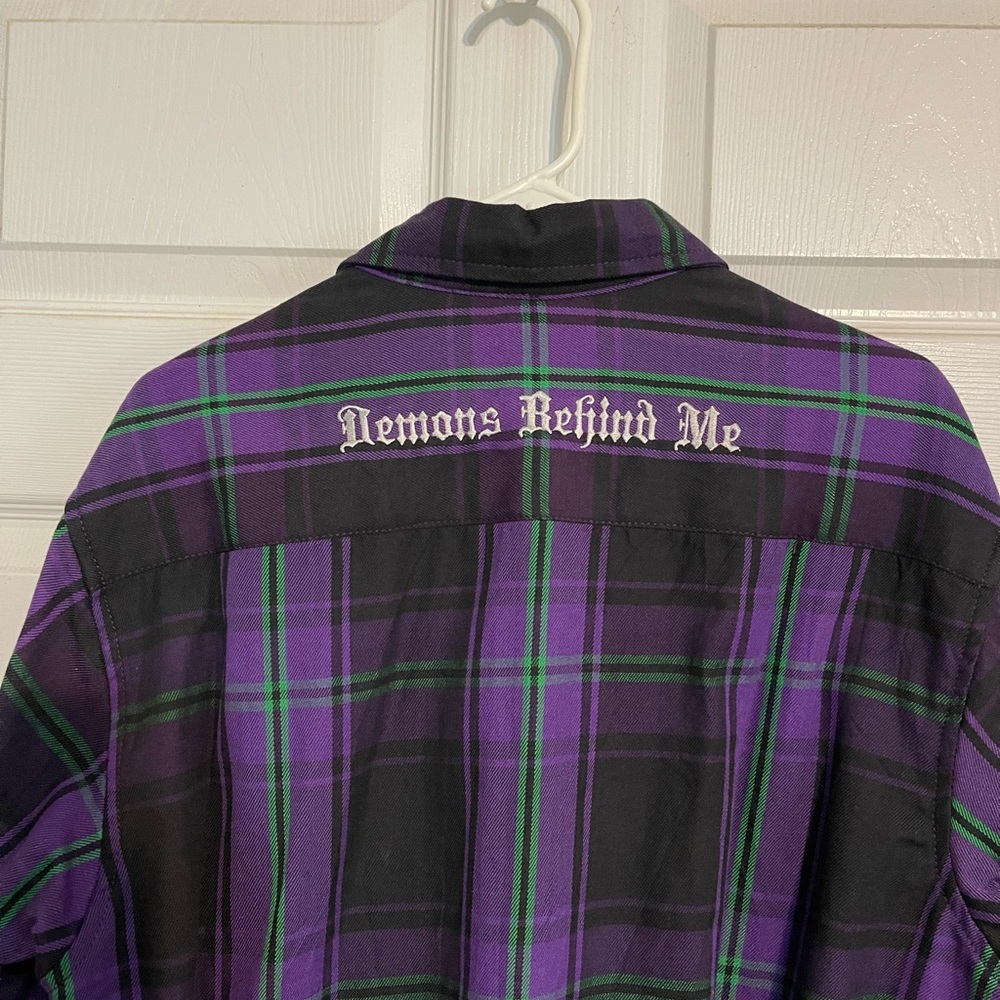 “ Demons Behind Me” brand, long sleeve flannel unisex flannel shirt.
